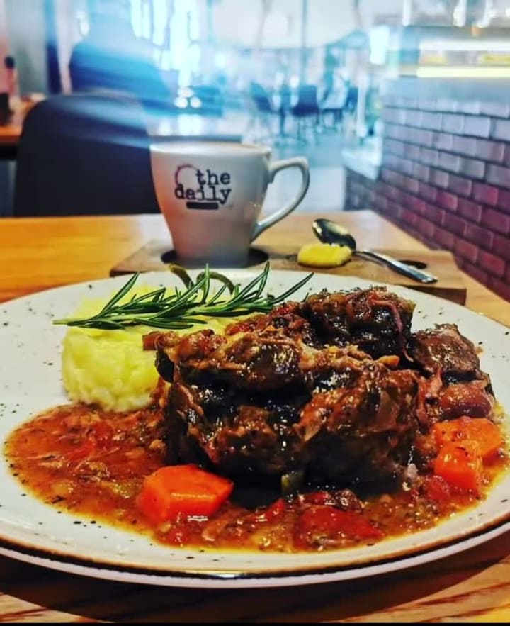 The daily coffe cafe